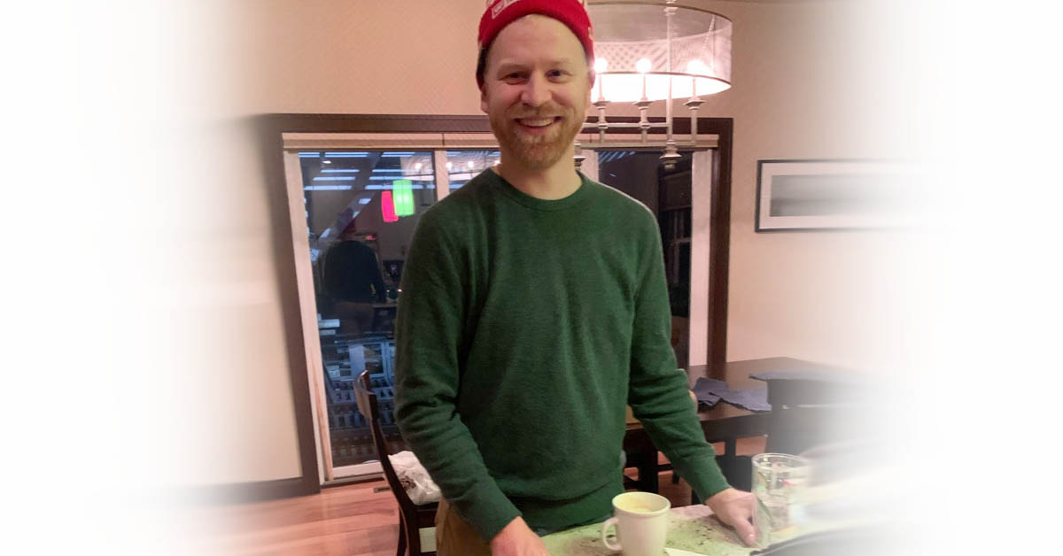 Dr. Matthew A. Schmidt stands at his kitchen counter.